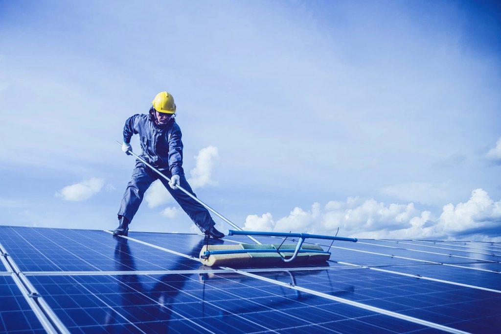 How to clean solar panels with specialized equipment.