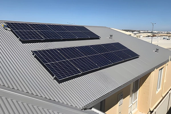 Front view of 10KW metal roof solar project in Costa Rica showing PV panel layout and mounting structure