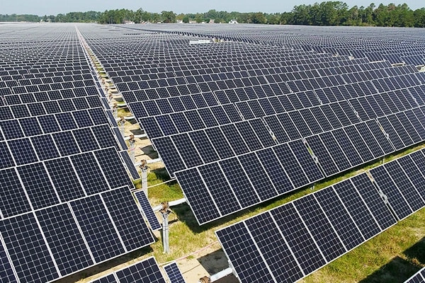 Front view of 100KW solar system in Zhejiang, China showing PV panel layout and single-axis tracking mounts